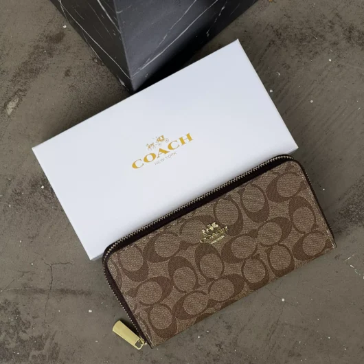 Гаманець Coach великий напис персиковий