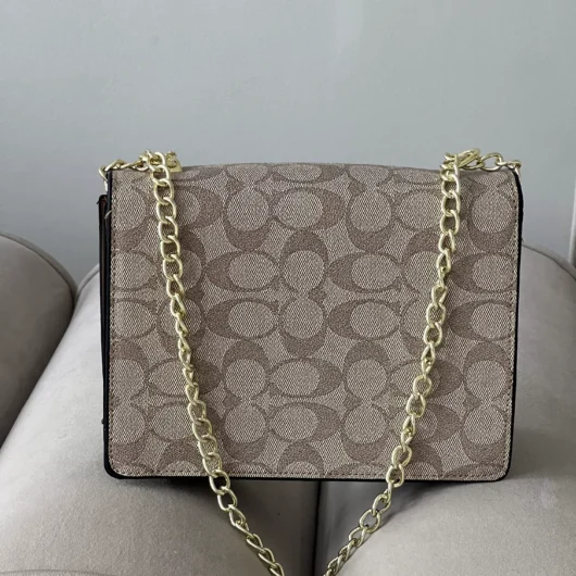 Жіноча сумочка Coach Mini Klare Crossbody бежевий