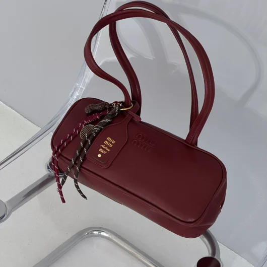 Сумка Miu Miu багет з брелком бордовий