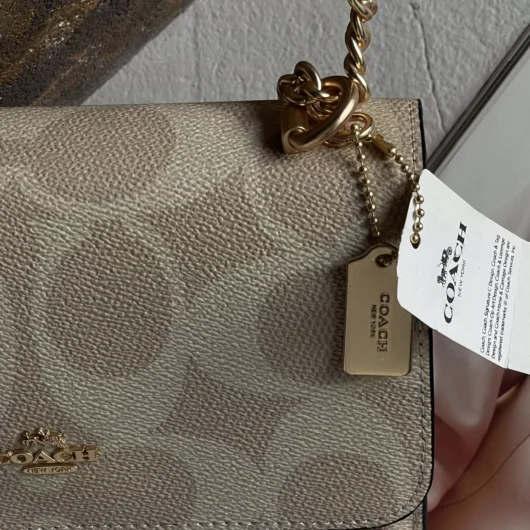 Сумка Coach Mini Klare Crossbody in Signature Canvas молочний