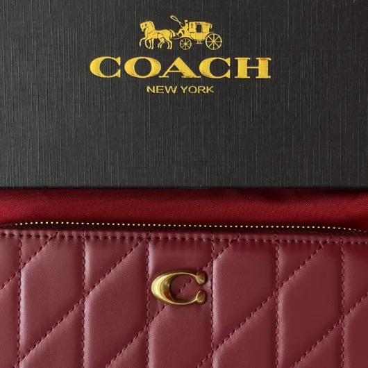 Гаманець Coach Quilted Leather Zip Around Long Wallet бордовий