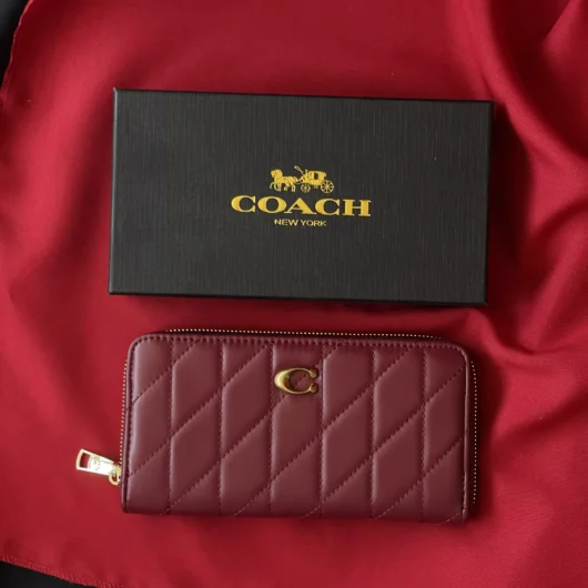 Гаманець Coach Quilted Leather Zip Around Long Wallet бордовий