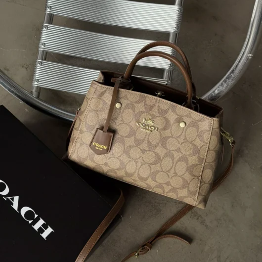 Сумка жіноча Coach через плече бежевий
