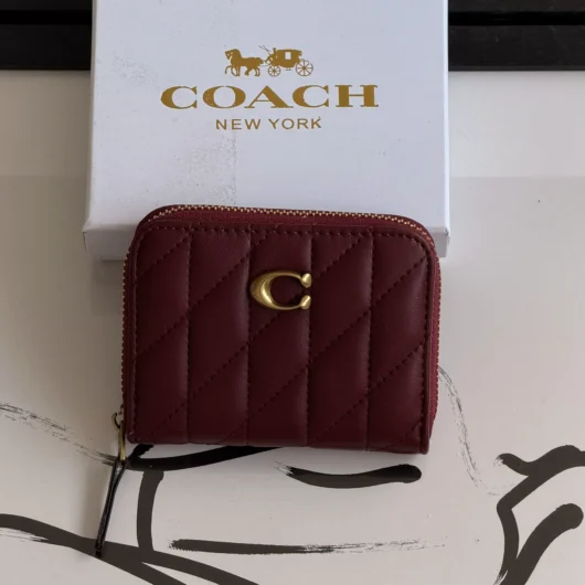 Гаманець Coach mini Quilted Pillow Essential Zip бордовий