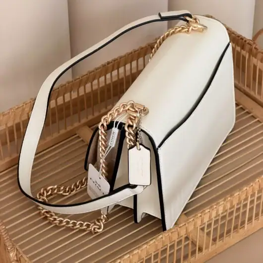 Сумка Coach Mini Klare Crossbody in Signature Canvas біло-пудровий