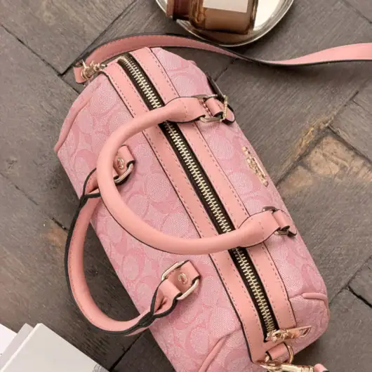 Сумка Coach Mini Rowan Crossbody In Signature рожевий