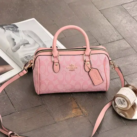 Сумка Coach Mini Rowan Crossbody In Signature рожевий