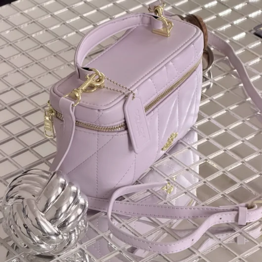 Сумка Coach Rainer Crossbody Bag 18 With Quilting лавандовий