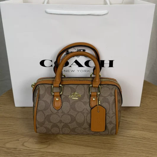 Жіноча сумка Coach Micro Rowan Crossbody In Signature бежево-карамельний