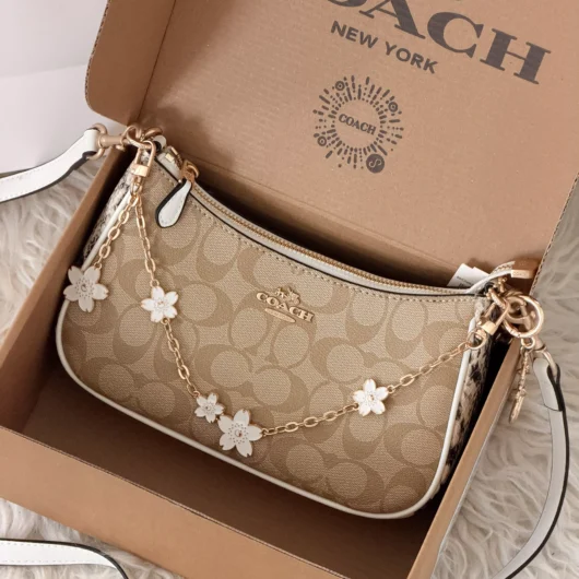 Сумка Coach Teri in Signature Canvas with Charms бежевий + пітон